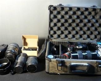 Camera And Lens Assort. Including, Minolta, Maxxum 330 SI RZ, Olympus OM-2, Minolta AF Reflex 500, Minolta 50mm, Quantary-MX, And More