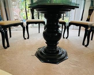 11_____$600 
80"wide round glass wood pedestal table with 8 black 
lacquer chairs made in Italy 