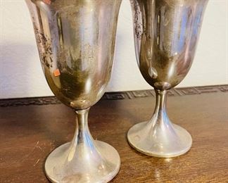 22_____$100 
Pair of Sterling goblets 8.65 oz