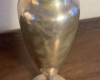 21_____$130 
Sterling vase 9.31 oz 