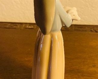 #64 -$34 -  lladro girl with pig #1011 porcelain figurine (we have boxes for most lladros) 