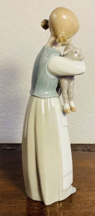 #68 -$40  Lladro girl with sheep #1010 retired 