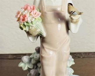 #76 - $50 - Lladro #5217 - Girl with bird, Flowers, Watering can 