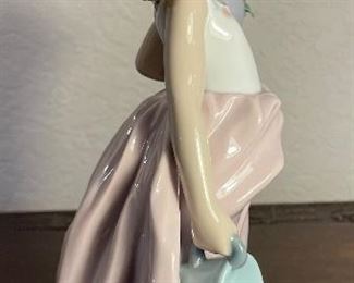 38_____$100 
Lladro girl flowers A Wish Come True1999 - 7676 - 10"