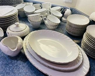 30_____$240 
Norleans set of china (white scallopped with silver rim)