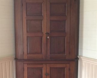 Monumental 19th century cypress corner cabinet, pegged construction, 97” high, 56” wide