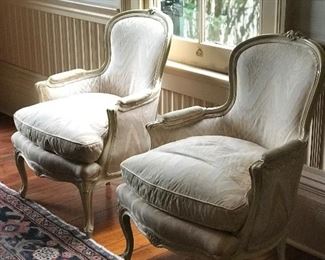 Pair of fabulous and comfortable Vintage French style carved bergeres upholstered in Boca Raton