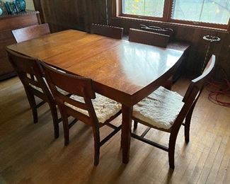 Mid-century modern dining table and 6 chairs. 