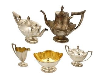 4005
A Gorham "Plymouth" Sterling Silver Tea And Coffee Service
20th century
Each marked for Gorham sterling
Comprising a coffee pot, tea pot, lidded sugar bowl, creamer, and waste bowl, 5 pieces
Largest: 9" H x 10.75" W x 4.75" D
72.625 oz. troy approximately
Estimate: $1,200 - $1,800