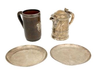 4014
A Group Of Silver And Metal Holloware Table Items
19th/20th century
With various maker's marks, three marked for sterling
Comprising a silver-plated tankard, a leather-clad copper tankard with sterling silver rim, and two English sterling silver plates with hallmarks for London dated 1830, 4 pieces
Largest: 6.875" H x 6.75" W x 4.25" D
Weighable sterling: 57.79 gross oz. troy approximately
Estimate: $800 - $1,200