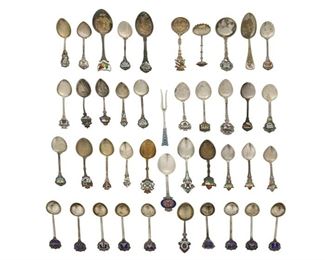 4015
A Group Of Silver Souvenir Spoons
Late 19th/early 20th century
Most marked for sterling or .800 silver, various maker's marks
Comprising teaspoons depicting various locations in America, Canada, Europe, and Asia decorated with enamel overlays, 42 pieces
Largest: 4.75" L
13.07 gross oz. troy approximately
Estimate: $300 - $500