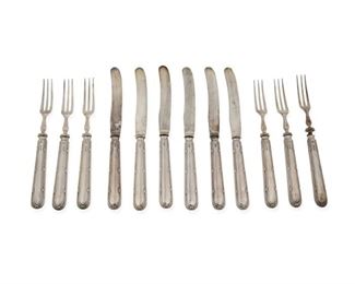 4016
An Edwardian English Sterling Silver Fruit Set
1911
Each marked with English hallmarks for Sheffield; unidentified maker's mark
Comprising six hollow-handled fruit knives (6.625") and six hollow-handled fruit forks (5.875") presented in the original velvet-lined case, 12 pieces
Estimate: $300 - $500