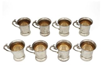 4020
A Set Of Silver Cups
20th century
Each marked for .900 silver
Each with stylized fish handle and pinched foot, 8 pieces
Each: 3.25" H x 4" W x 3" D
25.745 oz. troy approximately
Estimate: $400 - $600