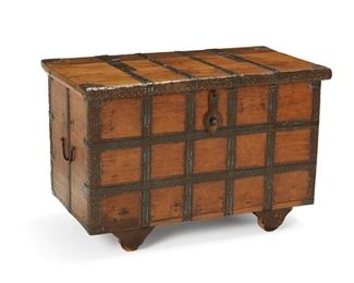 4028
An Indian Carved Wood Dowry Chest
20th century
The hinge-top chest fitted with iron straps, side handles, and pierced iron panels raised on wheels
20" H x 30.5" W x 18" D
Estimate: $300 - $500