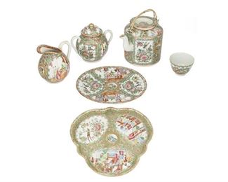4042
A Group Of Chinese Rose Medallion Porcelain Items
Early/mid-20th century
Each marked: China
Comprising a tea set, consisting of a teapot, lidded sugar, creamer, and one cup along with a serving tray, and an oval serving plate, 6 pieces
Largest: 5.75" H x 6.25" W 4.75" D: smallest: 2" H x 2.5" D
Estimate: $300 - $500