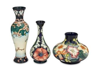 4049
A Group Of Moorcroft Pottery Vases
Late 20th/early 21st century; Burslem, England
Each with Moorcroft backstamp; with further various dates and markings
Each glazed ceramic, comprising cherry blossom, poppy, and one with mixed flowers, 3 pieces
Largest: 12" H x 3.25" Dia.
Estimate: $200 - $300