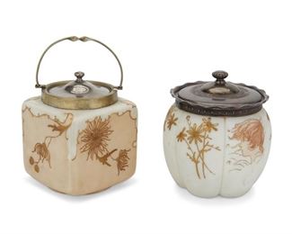 4052
Two Victorian Art Glass Biscuit Barrels
Late 19th/early 20th century
One lid marked: S.B. / 4402
Each satin opal glass with gold enamel flowers, one with a child's face, and fitted with a silver-plated lid, 2 pieces
Larger: 9.25" H x 5" W x 5" D
Estimate: $200 - $400