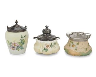 4053
Three Victorian Art Glass Biscuit Barrels
Late 19th/early 20th century
One marked: MW / 4426; one marked: P / 3954
Each opal glass jar with enamel flowers and ad fitted with a silver-plated lid and handle, comprising one Mount Washington and one Pairpoint, 3 pieces
Largest: 10.75" H x 5.5" Dia.
Estimate: $200 - $400