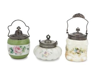 4054
Three Victorian Art Glass Biscuit Barrels
Late 19th/early 20th century
Each opal glass jar with polychrome painted flowers and fitted with a silver-plated lid and handle, 3 pieces
Largest: 11.75" H x 5.25" W x 5.25" D
Estimate: $200 - $400