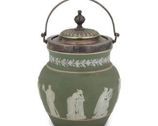 4055
A Wedgwood Green Jasperware Biscuit Barrel
Late 19th century
Base impressed: Wedgwood / England
The ceramic stoneware jar with white cameo-like relief decorations of Classical figures and fitted with a silver-plated lid and handle
8.5" H x 5.25" Dia.
Estimate: $200 - $300