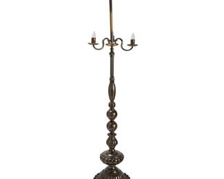 4066
A Tall Patinated Brass Floor Lamp
20th century
The three-light column-style lamp with gadrooned foot, lacking shade
75" H x 18" W
Estimate: $300 - $500