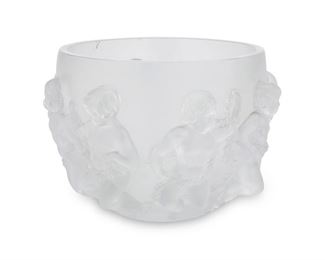 4074
A Lalique "Luxembourg" Crystal Bowl
Circa 1978-present
With faint engraved signature: Lalique ® France
The frosted lead glass bowl encircled by dancing putti or cherubs with garlands
8.25" H x 12.5" Dia.
Estimate: $500 - $700