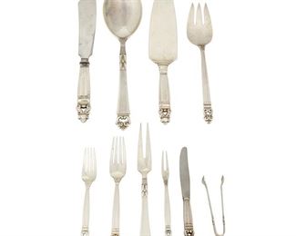 4077
Georg Jensen (1866-1935, Danish)
An "Acorn" sterling silver flatware service, circa 1930s
Each marked for Georg Jensen sterling
Designed 1915 by Georg Jensen, comprising 1 hollow-handled cake
server (10.375"), 1 hollow-handled cake knife (10.5"), 7 hollow-
handled butter spreaders (6.625"), 1 dinner fork (7.75"), 12 place
forks (6.625"), and 2 pickle forks (6.5"), sold together with 4
similarly designed serving pieces from Frigast and International
"Royal Danish," 28 pieces
Weighable sterling: 31.805 oz. troy approximately
Estimate: $700 - $900