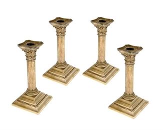 4082
A Set Of Gorham Sterling Silver Weighted Candlesticks
20th century
Each marked for Gorham and sterling, numbered: A3206
Each in the form of a Corinthian column with removable bobeche, 4 pieces
Each: 8.25" H x 4.125" W x 4.125" D
Estimate: $800 - $1,200