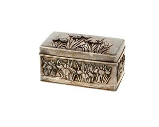 4083
A Japanese Sterling Silver Box
Late 19th/early 20th century, Meiji Period (1868-1912)
Marked: Arthur & Bond / Yokohama
The small lidded box with irises
1.75" H x 3.5" W x 1.875" D
3.675 oz. troy approximately
Estimate: $400 - $600