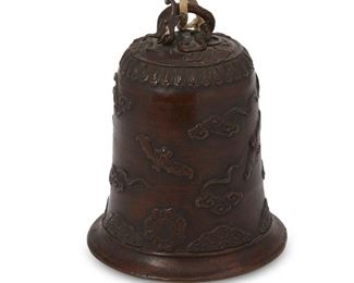 4085
A Japanese Bronze "Bonsho" Temple Bell With Bats Design
Early 20th century
With partial paper sticker label on the interior, character indiscernible
With cloud, bat, and medallion decoration and a dragon finial
7.5" H x 6" Dia.
Estimate: $500 - $700