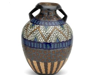 4089
A French Quimper "Odetta" Faience Pottery Vase
Circa 1930s-40s
Marked: [HB] / Quimper / Odetta / 582 . 1265
The tin-glazed stoneware vase with flared neck and opposed handles
16.5" H x 11.5" Dia.
Estimate: $400 - $600