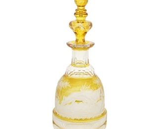 4094
A Bohemian Cut-Glass Decanter
Late 19th/early 20th century
The art glass decanter intaglio cut from amber to clear with stags and trees with a ribbed band to the foot
13.25" H x 5" Dia.
Estimate: $300 - $500