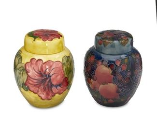 4113
Two Moorcroft Pottery Ginger Jars
Late 20th/early 21st century; Burslem, England
Each with Moorcroft backstamp; with further various dates and markings
Each glazed ceramic, comprising red hibiscus and pomegranate, 2 pieces
Each: 7.75" H x 6" Dia.
Estimate: $200 - $300