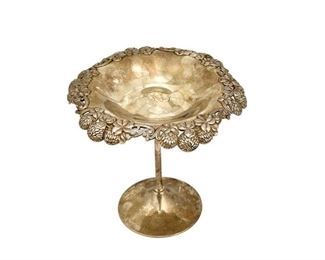 4115
A Tiffany & Co. Sterling Silver Tazza
Circa 1902-1907, directorship of Charles T. Cook
Marked: Tiffany & Co. / 16073 Makers 2661 / Sterling Silver / 925-1000 / C
With a clover flower rim
6.25" H x 6.75" Dia.
11.985 oz. troy approximately
Estimate: $600 - $800