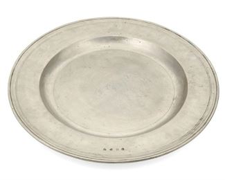 4120
A Match "Scribed Rim" Italian Pewter Charger
21st century
Paper label: Match, Made in Italy; Various hallmarks
A modern Italian handmade charger with decorative hallmarks and scribed rim
1.25" H x 18.125" Dia.
Estimate: $200 - $300