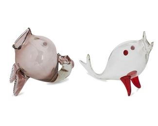 4122
Two Italian Murano Glass Fish Figures
20th century
Appear unsigned
Each blown glass, comprising a clear glass fish with red accents and a translucent purple fish, 2 pieces
Largest: 13.5" H x 16" W x 4.75" D
Estimate: $400 - $600