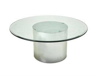 4137
A Brueton-Style Polished Chrome And Glass Cocktail Table
Circa 1980s
The contemporary table with a polished, cylindrical chrome base and a circular glass top
20.5" H x 48" Dia.
Estimate: $400 - $600