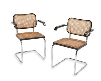 4152
Two Marcel Breuer "Cesca" Armchairs, For Gavani Italy
Mid-20th century
Each with silver foil Gavani Italy label to underside
Designed 1928, each cantilevered armchair with a woven cane seat and back in a black painted beech frame on tubular steel supports, 2 pieces
Each: 31" H x 23.375" W x 20" D
Estimate: $200 - $400