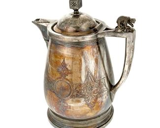 4163
An American Silver-Plated Hot Water Pitcher
Mid-19th century
Marked: Roger's, Smith & Co. / New Haven Conn. / June 8, 1868
With chased medallions, figural bear handle, and porcelain lined interior
12.5" H x 10" W x 6.5" D
Estimate: $200 - $300