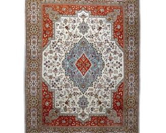 4167
A Taba Tabriz Area Rug
Late 20th century
Wool on cotton foundation, with polychrome floral motifs and central medallion with orange accents
12'4" L x 8'7" W
Estimate: $600 - $800