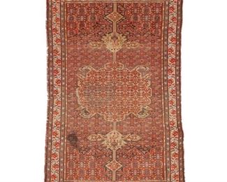 4169
A Persian Rug
Early 20th century
Wool on cotton foundation, with elongated medallion on a red field
6' L x 4'3" W
Estimate: $300 - $400