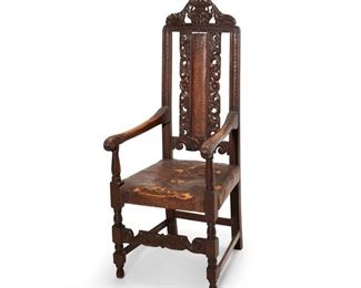 4172
A Continental Carved Wood Armchair
18th century
The wood carcass with carved floral motifs and inset tooled leather back splat and seat
47.25" H x 18.5" W x 20" D
Estimate: $400 - $600