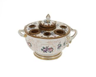 4190
A Continental Porcelain Inkwell
Late 19th/early 20th century
Glazed white porcelain decorated with painted enamel floral sprays, with central lidded inkwell and five pen holders
4.75" H x 6" W x 4.75" D
Estimate: $300 - $500