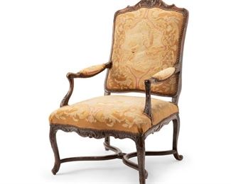 4216
A French Louis XV-Style Armchair
Late 19th century
The carved wood carcass with rocaille motifs and needlepoint upholstery depicting Diana with her hound surrounded by nail head trim
42" H x 27" W X 30" D
Estimate: $300 - $500