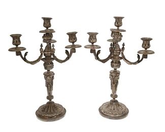 4221
A Pair Of French Silver-Plated Convertible Candelabra
Late 19th/early 20th century
Each three-arm, four-light candelabrum with foliate swags and lion's masks, with removable top to convert to a candlestick, 2 pieces
Each: 18" H x 11.5" W x 11.5" D
Estimate: $300 - $500