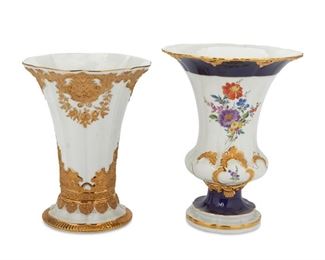 4225
Two Meissen Porcelain Vases
Circa 1934-1944
Both marked for Meissen; each numbered variously
Comprising one vase with a white ground, blue trim, and floral decoration and one with white ground and gilt floral decoration, 2 pieces
Largest 9.5" H x 7" Dia.; smallest: 8.75" H x 6.25" Dia.
Estimate: $500 - $700