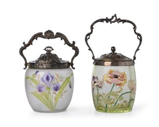4231
Two Victorian Art Glass Biscuit Barrels
Late 19th/early 20th century
Comprising a frosted clear glass jar with purple irises and gold enamel details fitted with a silver-plated lid and handle (9" H x 6.75" Dia.) and a translucent green jar with enamel flowers fitted with a silver-plated lid and handle (11" H x 6.5" Dia.), 2 pieces
Estimate: $300 - $500