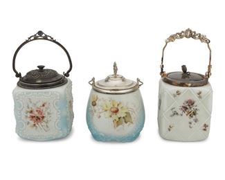 4234
Three Victorian Art Glass Biscuit Barrels
Late 19th/early 20th century
Possibly Pairpoint Wave Crest, each opal glass with polychrome painted flowers and fitted with a silver-plated lid and handle, 3 pieces
Largest: 11.25" H x 5.25" W x 5.25" D
Estimate: $200 - $400