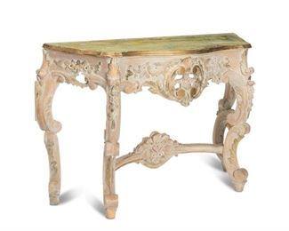 4241
An Italian Regency-Style Console Table
Late 20th century
Deeply carved with limed wood finish and with faux painted green marble top
32" H x 47.5" W x 16.75" D
Estimate: $600 - $900