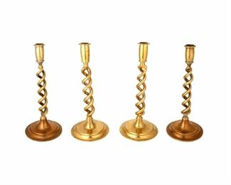 4243
A Group Of English Spiral Brass Candlesticks
19th/20th century
Each open barley twist-style, 4 pieces
Each: 12" H x 5.25" Dia.
Estimate: $200 - $300